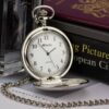 engraved silver classic pocket watch with books