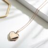 Small rose gold heart locket