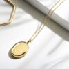 Small oval plain gold locket