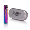 engraved clipper rainbow lighter beside tin