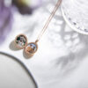 Open round rose gold locket