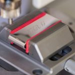 personalised-money-clip-being-engraved