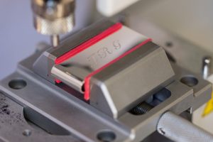 personalised-money-clip-being-engraved