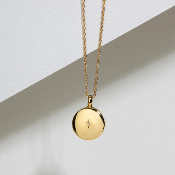 Diamond-Set-Round-Ashes-Urn-Necklace-Lifestyle-Gold