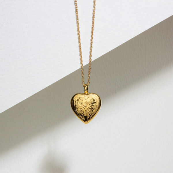 Scroll-Heart-Ashes-Urn-Necklace-Lifestyle-Gold